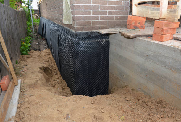 SJ Waterproofing Pros technician performing targeted Waterproofing assessment in Goodspring, TN
